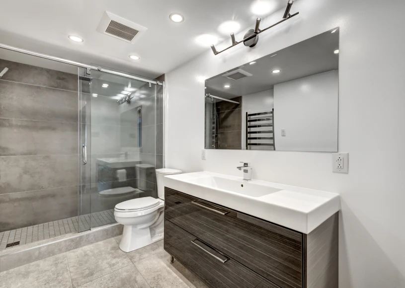 Elegant bathroom with glass shower enclosure
