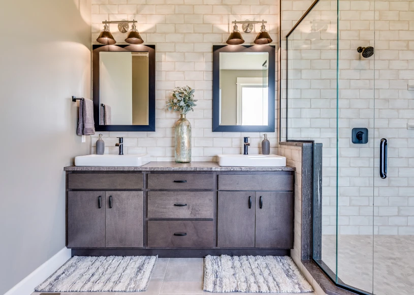 Stylish bathroom with glass shower enclosure