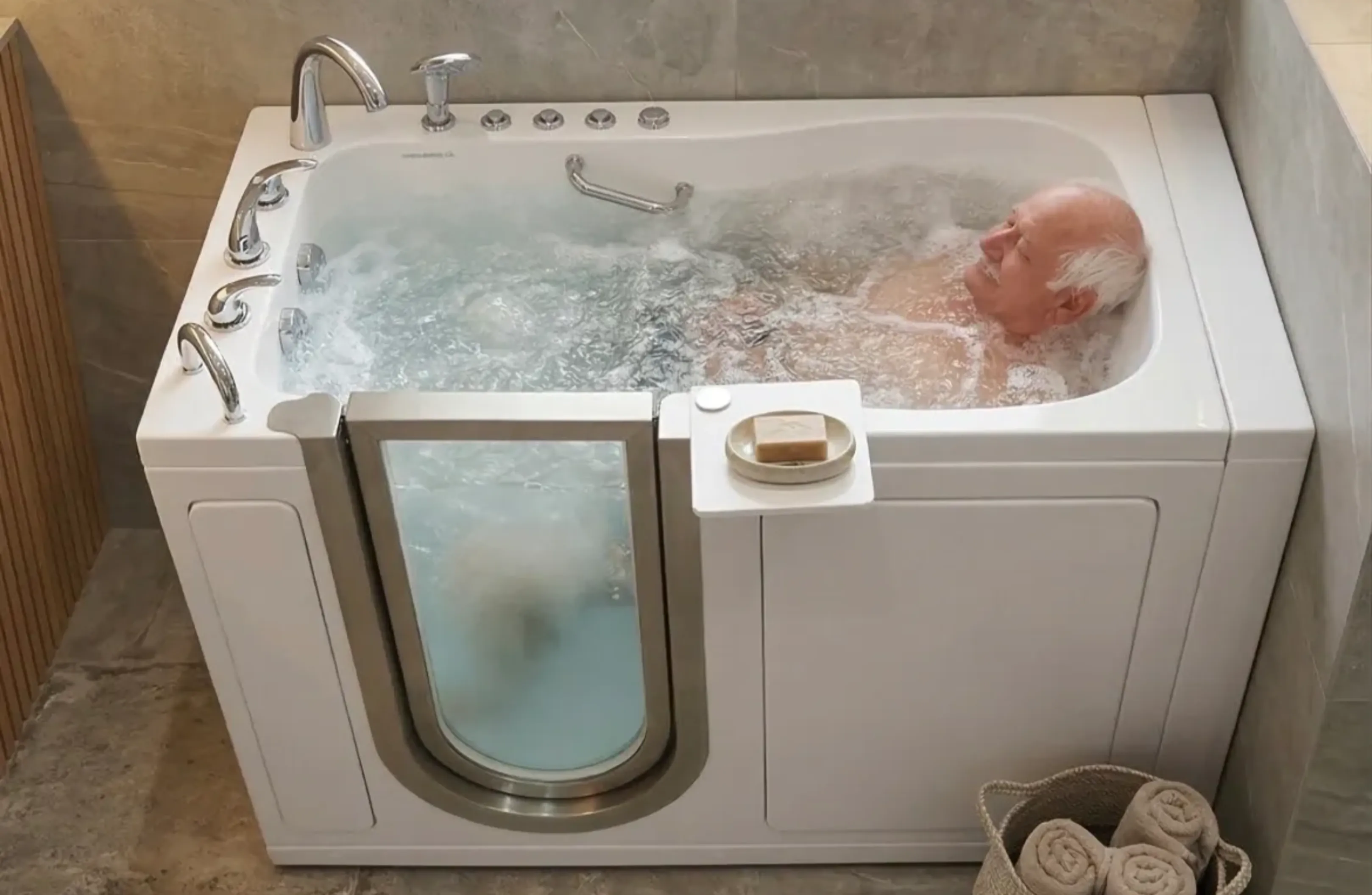 A person relaxing in a walk-in bathtub filled with bubbles.