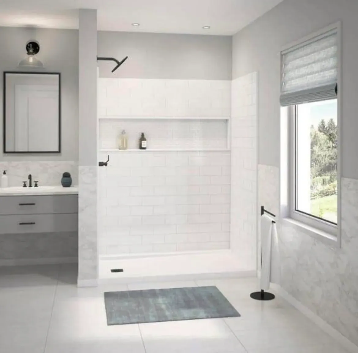 Bright modern bathroom with white tiles and a large window.